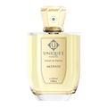 A bottle of AKDENIZ perfume by Unique'e Luxury with a gold-colored cap and a label indicating it is an extract de Parfum.