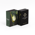 Wood & Mood Absolute Extrait de Parfum by Unique’e Luxury with dark forest inspired illustrated packaging and black presentation box
